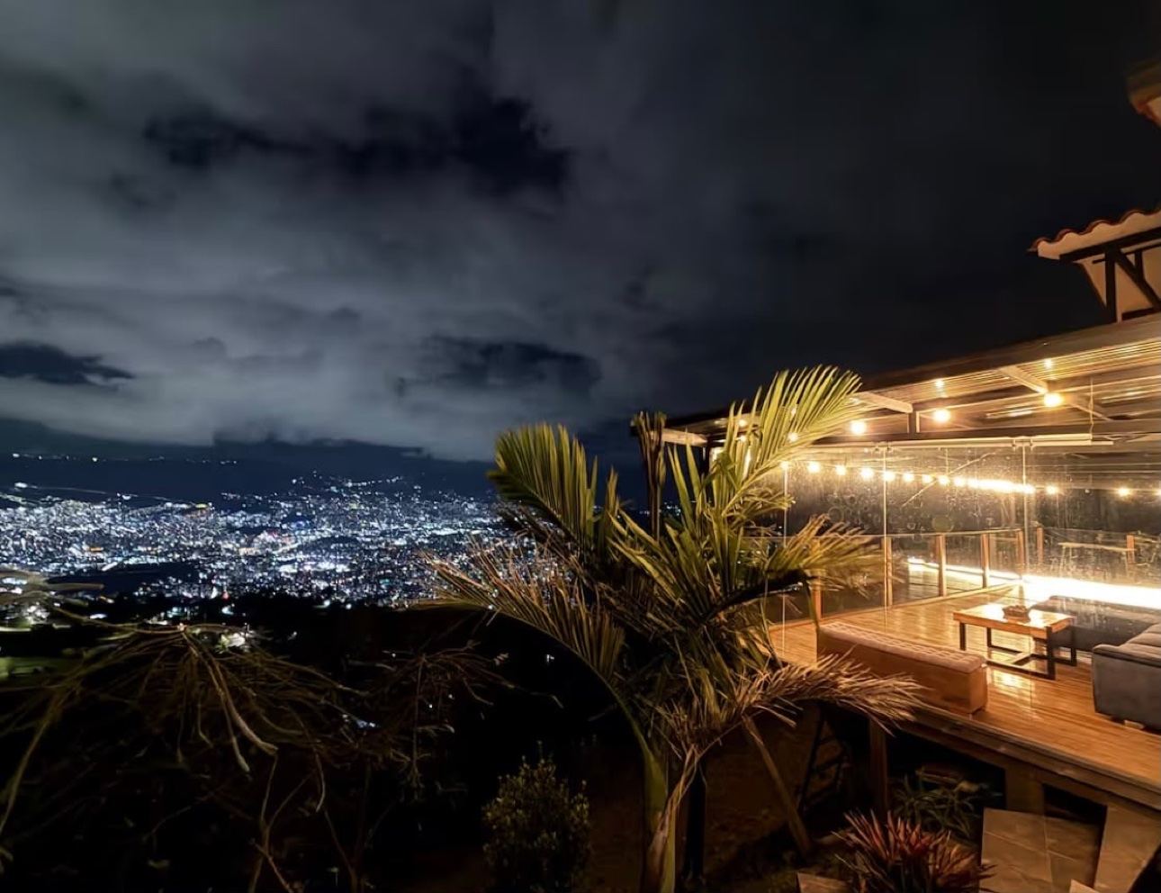 Night terrace overlooking Medellín city lights