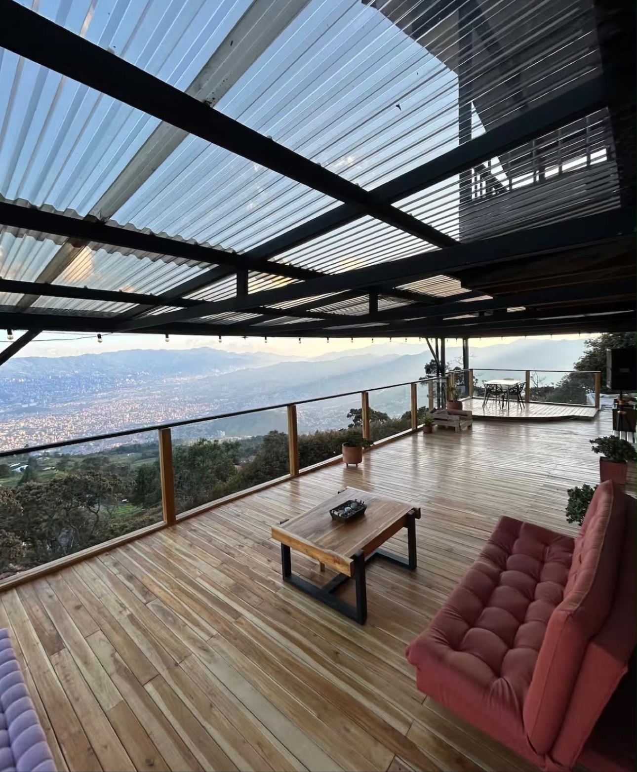 Daytime deck with panoramic Medellín view