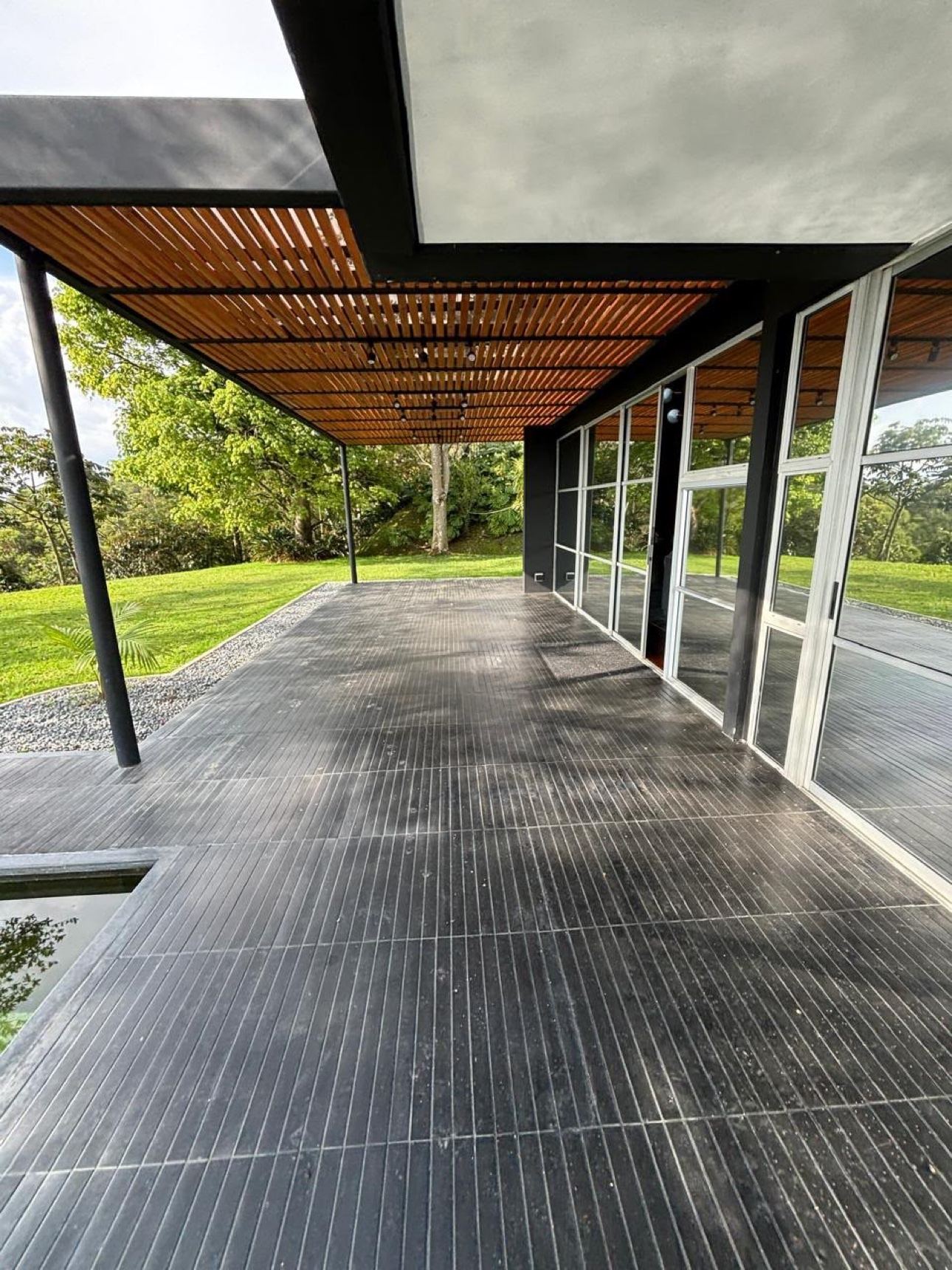 Covered outdoor terrace at the sublease four-bedroom Las Palmas villa