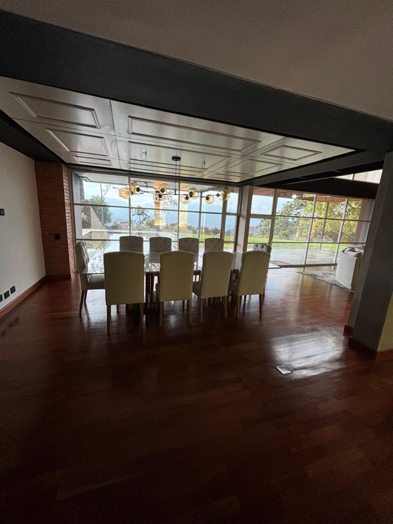 Open living area with floor-to-ceiling windows