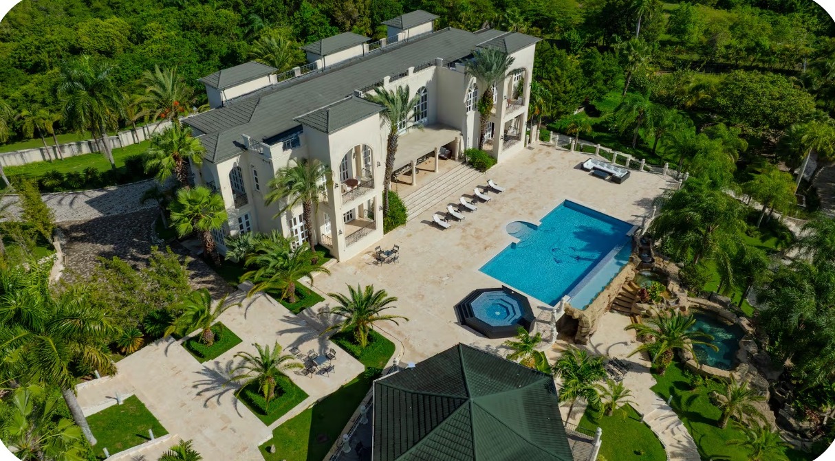 Aerial view of the private six-bedroom mansion, massive pools, and jungle surroundings in the Dominican Republic