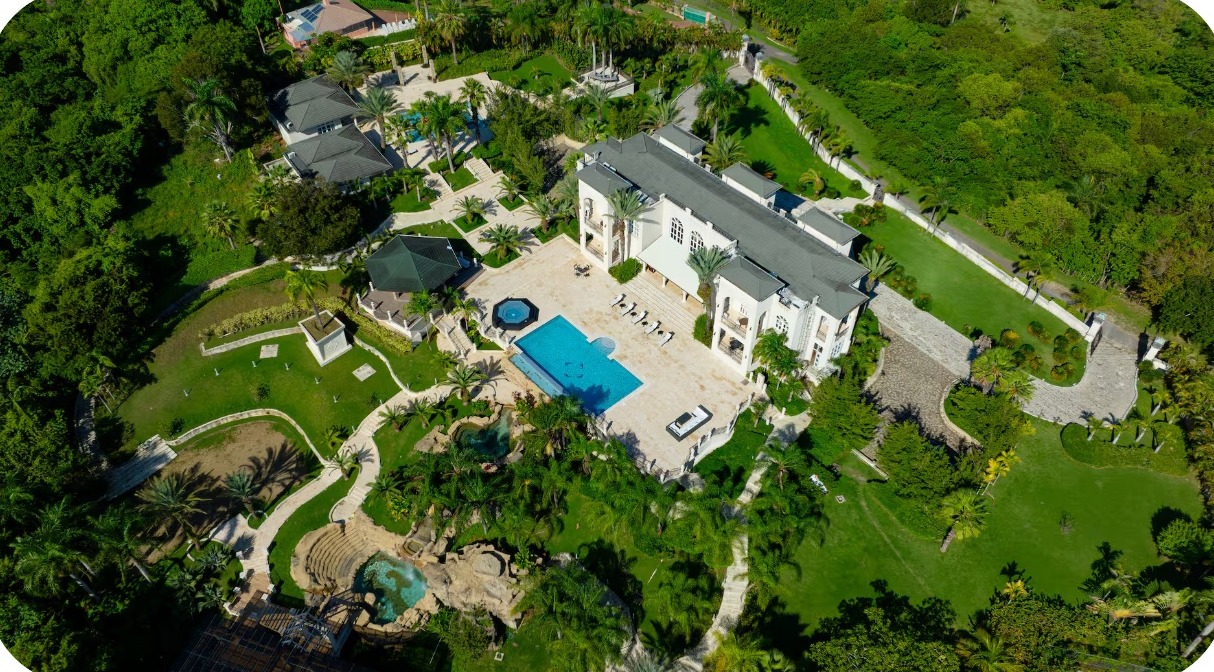 Aerial view of the mansion surrounded by Dominican Republic jungle
