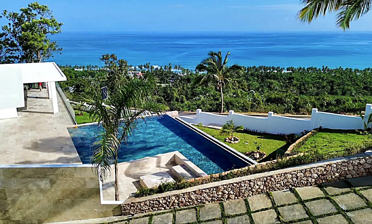Oceanfront view over the villa pool in the Dominican Republic