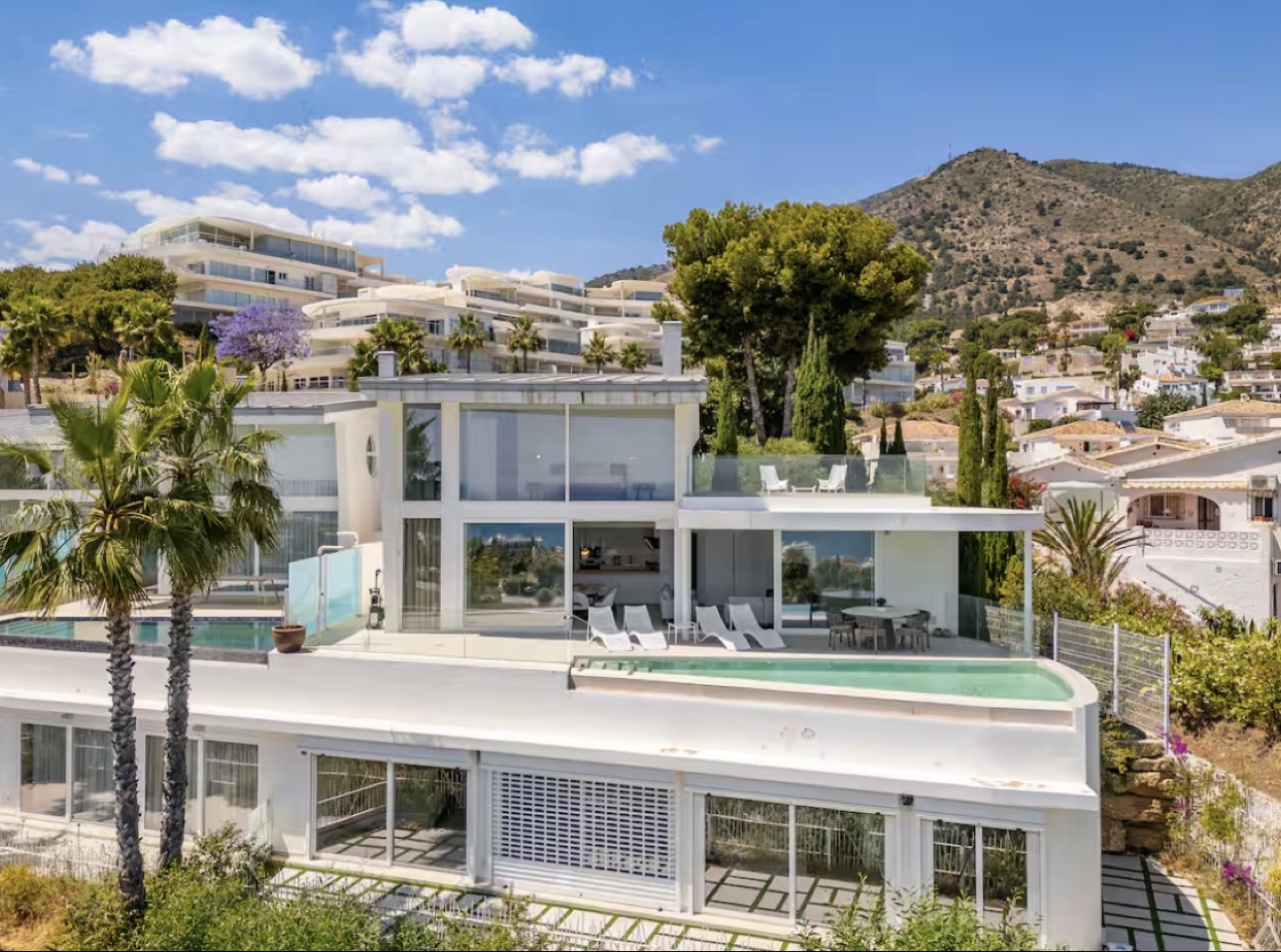 Modern villa exterior with mountain views in Spain