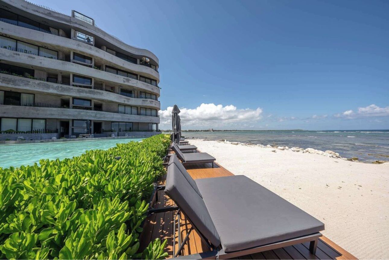 Ocean-view terrace at the Tulum beachfront condo